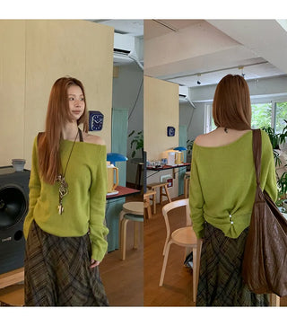 green diagonal sweater