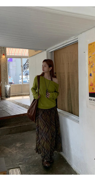 green diagonal sweater