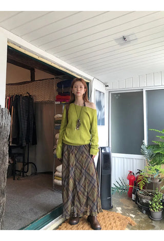 green diagonal sweater