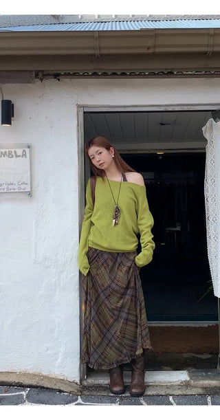 green diagonal sweater
