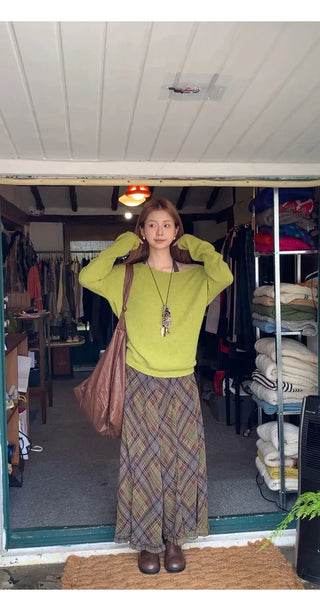 green diagonal sweater