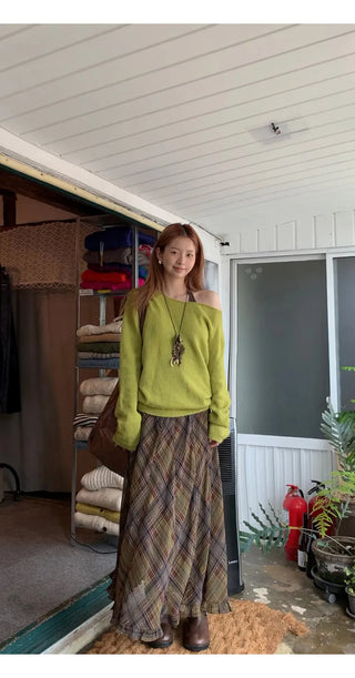 green diagonal sweater