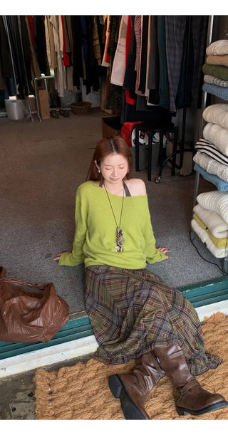 green diagonal sweater