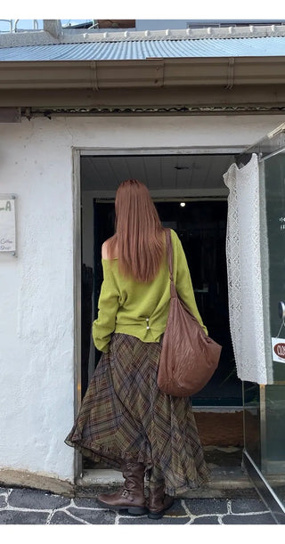 green diagonal sweater