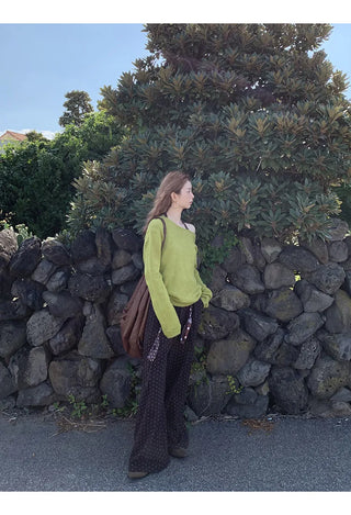 green diagonal sweater