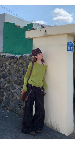 green diagonal sweater