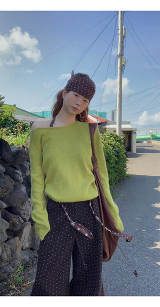 green diagonal sweater