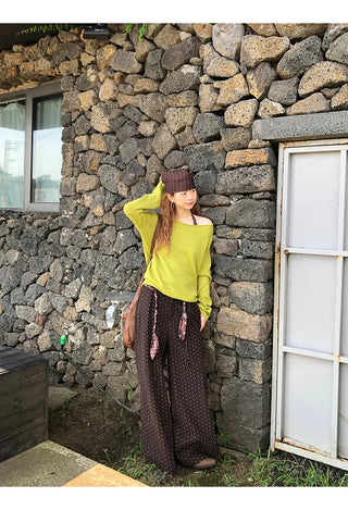 green diagonal sweater