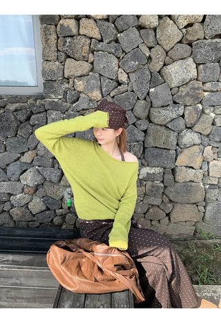 green diagonal sweater