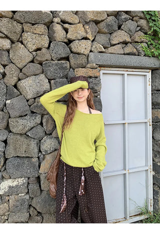 green diagonal sweater