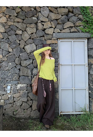 green diagonal sweater