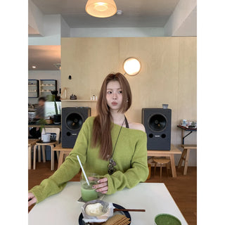 green diagonal sweater