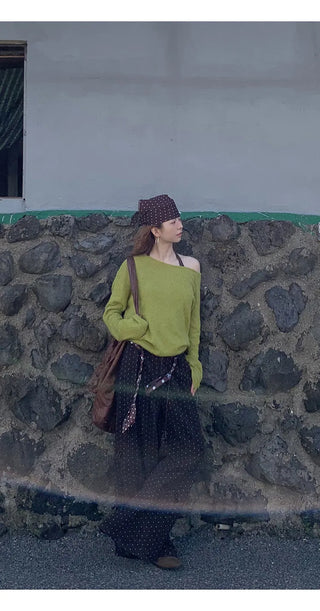 green diagonal sweater