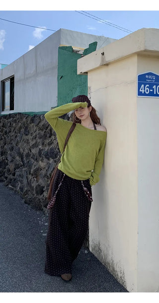 green diagonal sweater