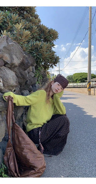 green diagonal sweater