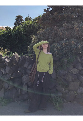 green diagonal sweater