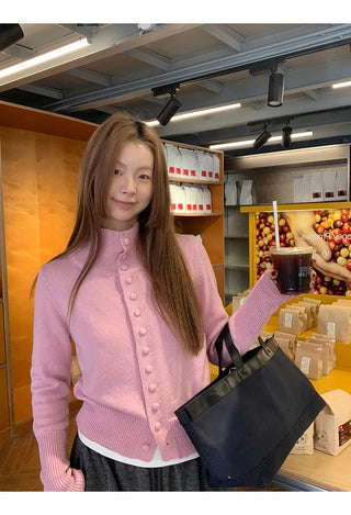 pink turtleneck cardigan