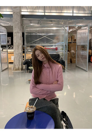 pink turtleneck cardigan