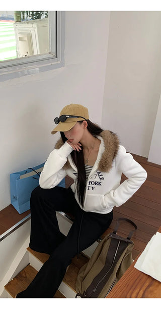 white hooded sweater