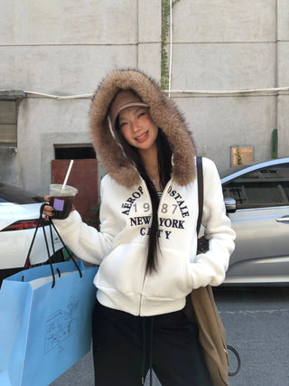 white hooded sweater