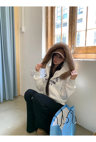 white hooded sweater