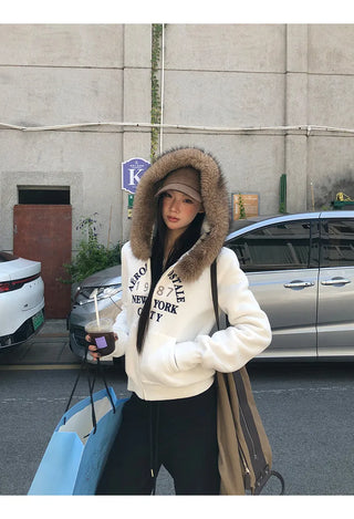 white hooded sweater