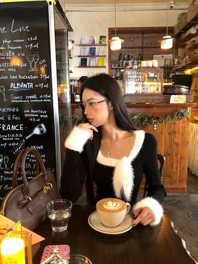 black niche sweater