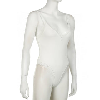 V -neck shows a thin suspender vest