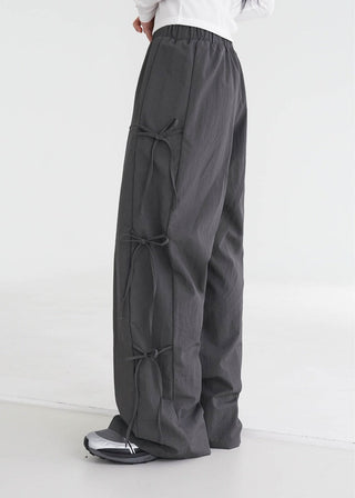 Strap bows wide -leg pants
