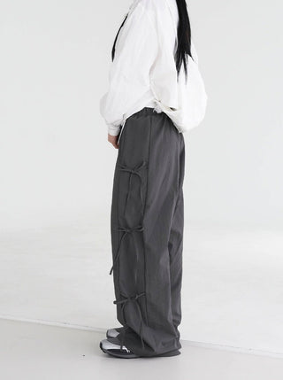 Strap bows wide -leg pants