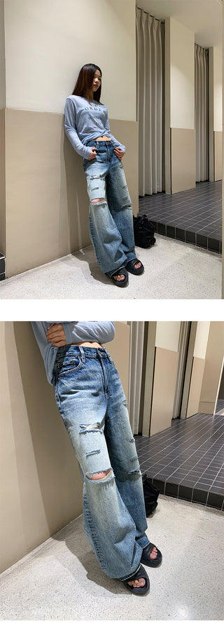 tattered wide jeans