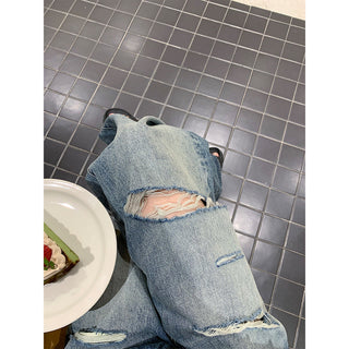 tattered wide jeans
