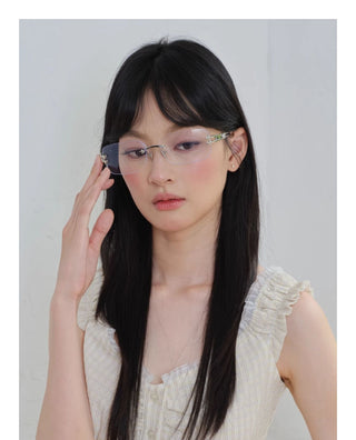 silver frameless glasses