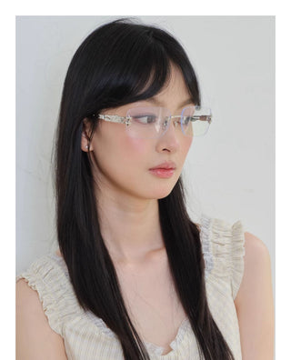silver frameless glasses