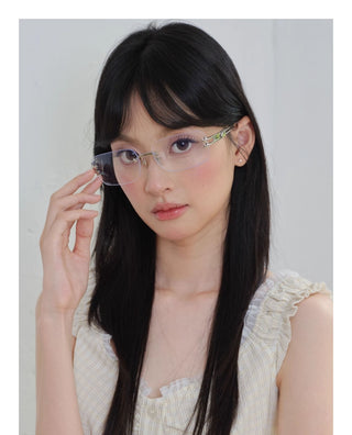 silver frameless glasses