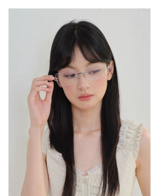 silver frameless glasses