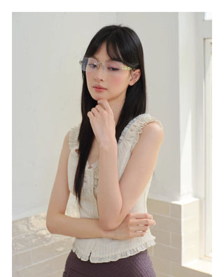 silver frameless glasses