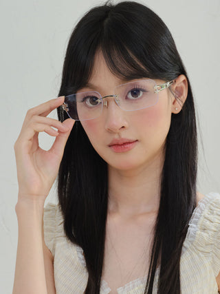 silver frameless glasses