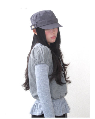 black peaked cap