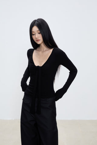black V-neck top