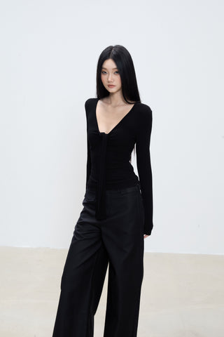 black V-neck top