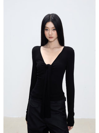 black V-neck top