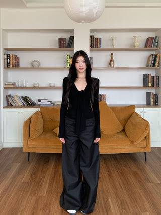 black V-neck top