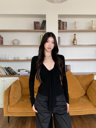 black V-neck top