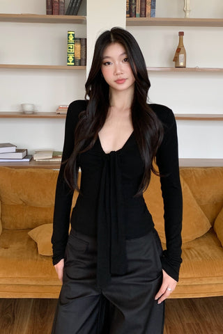 black V-neck top