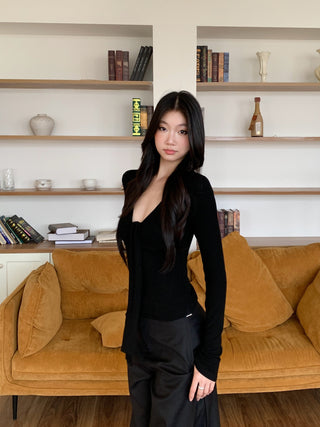 black V-neck top