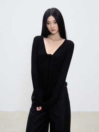 black V-neck top