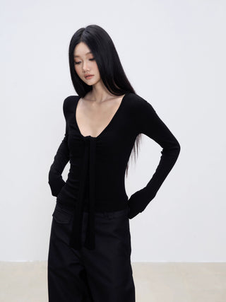 black V-neck top