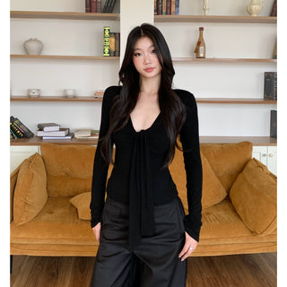 black V-neck top