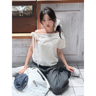 white embroidered shirt